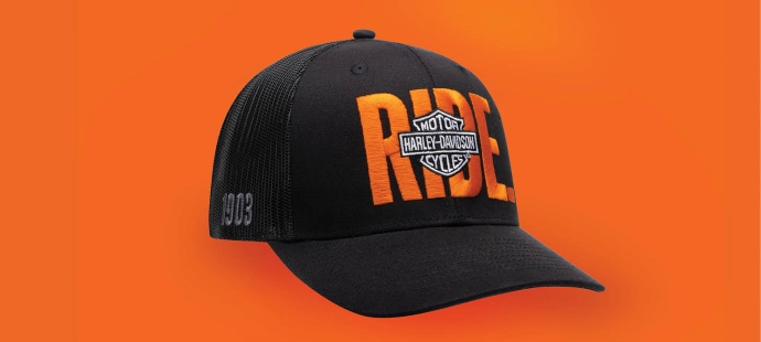 Baseball cap with H-D Logo and RIDE placed on orange background