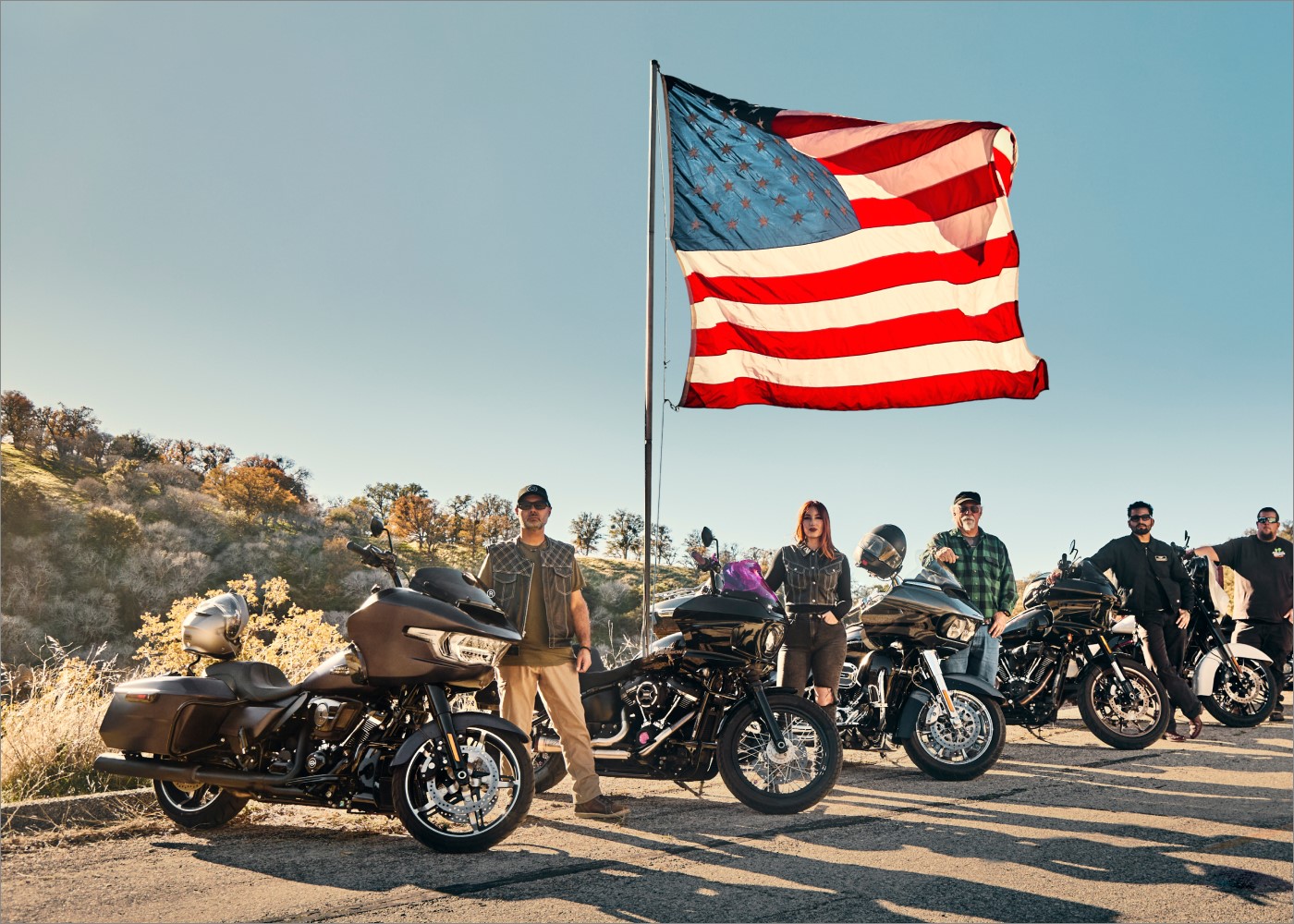 riders-near-motorcycles-american-flag-ls